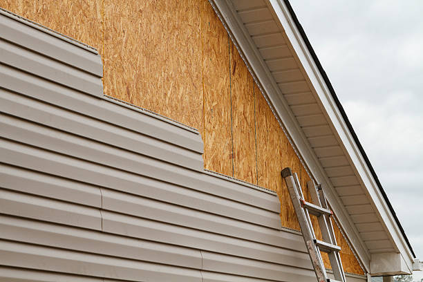 Professional Siding Installation technician working in Marriottsville, MD